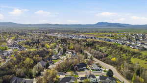 Aerial view of residential area featuring mountains