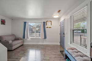 Sitting room with wood finished floors