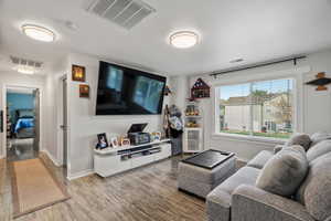 Living area with wood finished floors