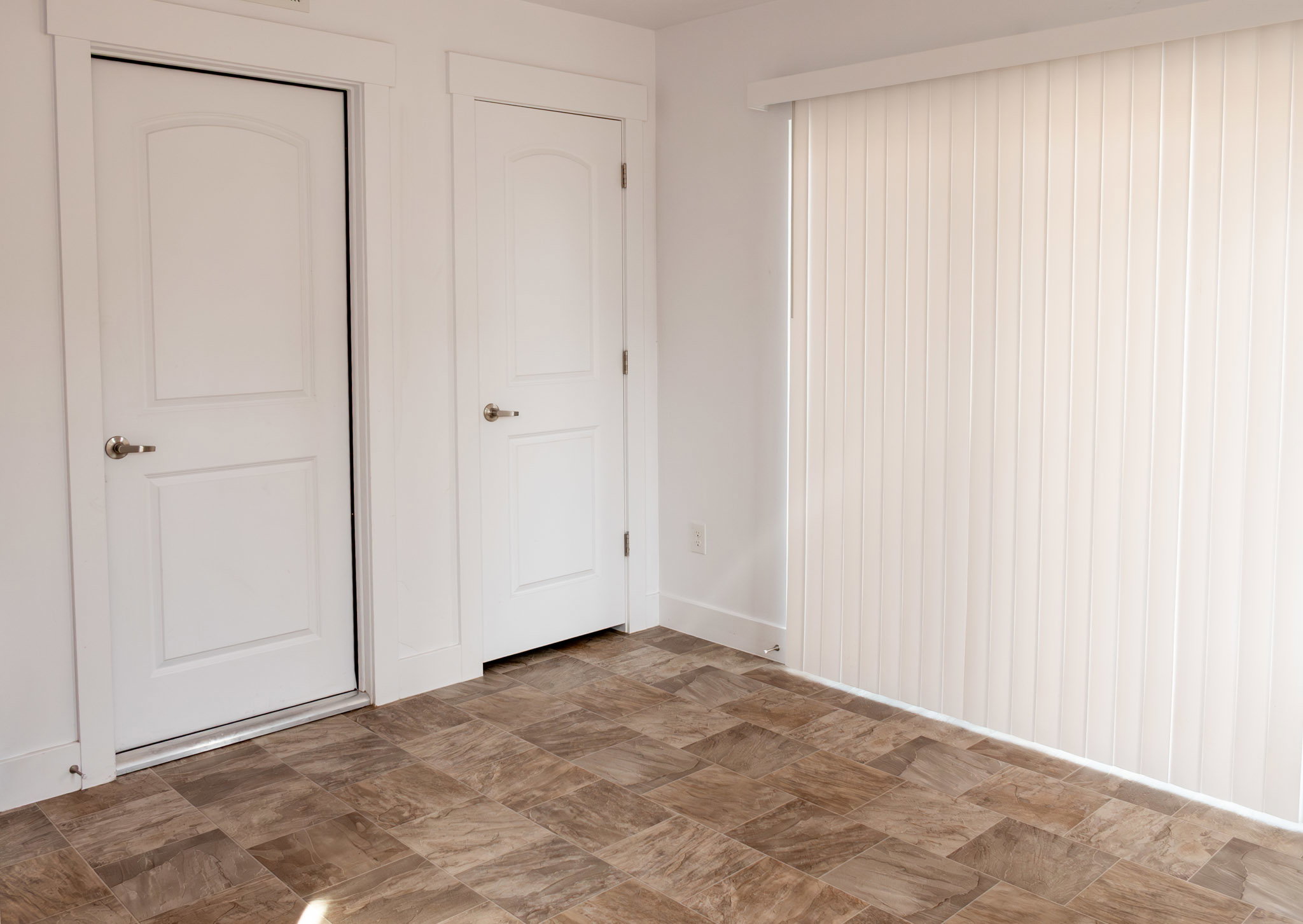 Entry with Sliding glass doors that go out to Patio