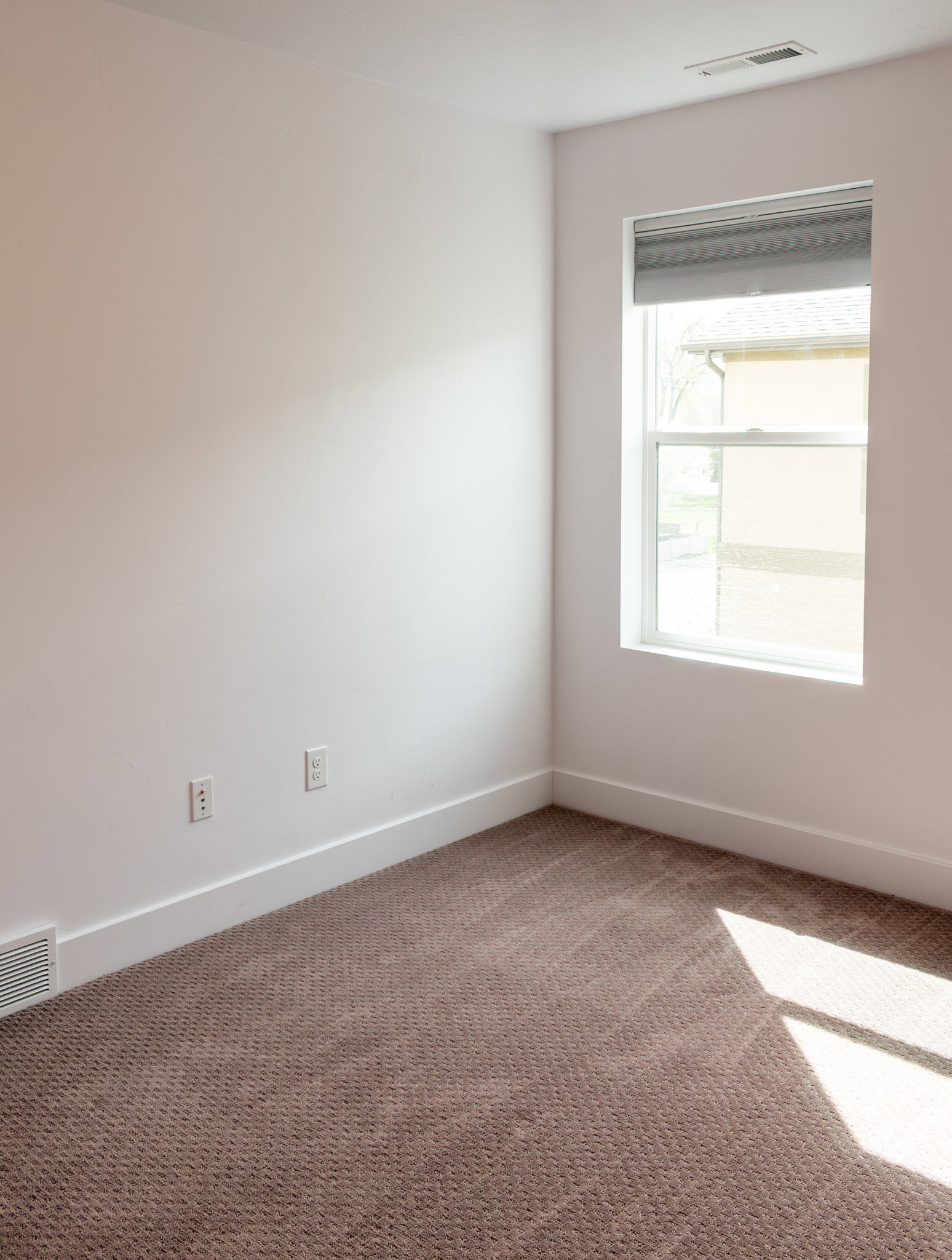 2nd Bedroom Carpeted with baseboards