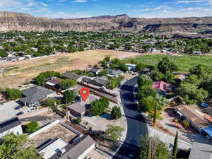Aerial view of residential area featuring mountains