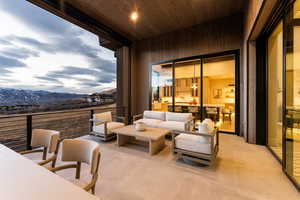 View of patio / terrace with a mountain view and an outdoor hangout area