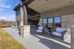 Patio / terrace with a patio area and an outdoor hangout area