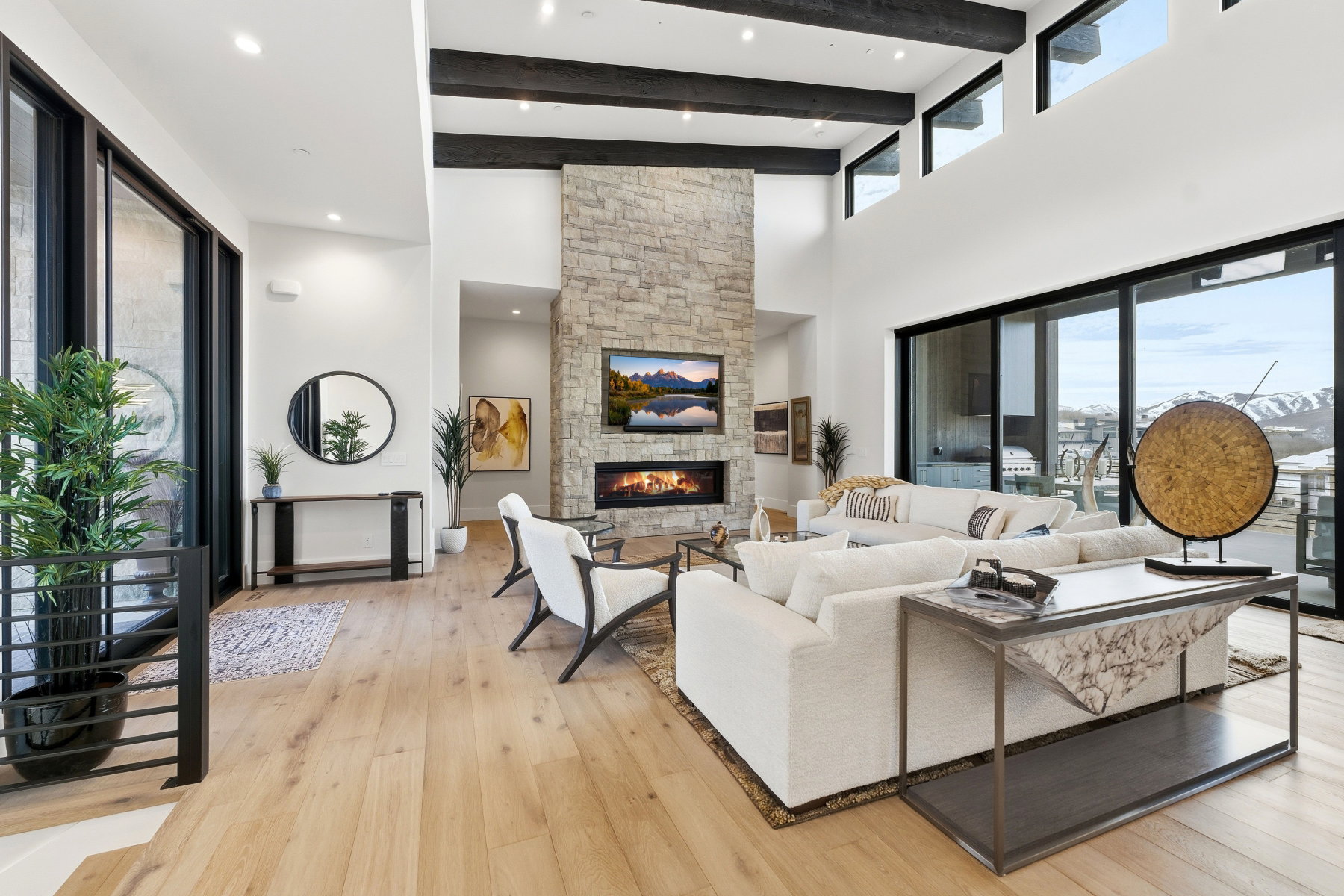 Living area featuring light wood-type flooring and a fireplace