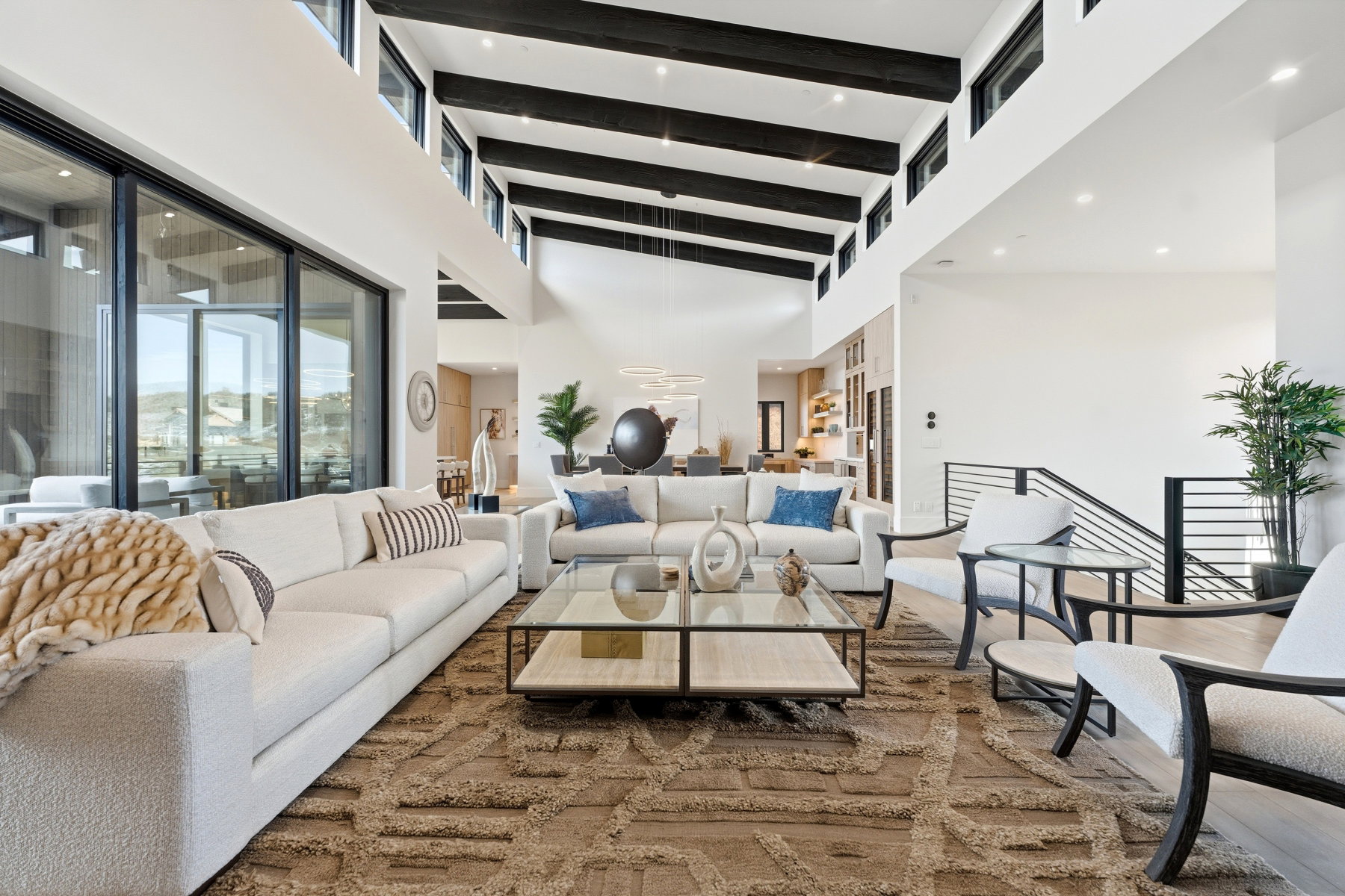 Living room with wood finished floors and recessed lighting