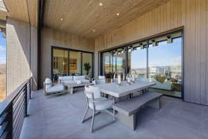 View of patio with an outdoor living / dining area