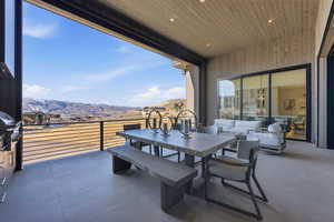 View of patio / terrace with a mountain view, area for grilling, and outdoor dining area