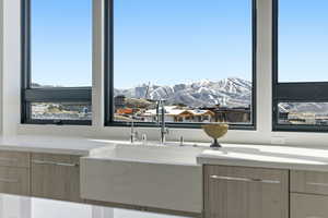 Kitchen view of modern cabinets and light stone countertops