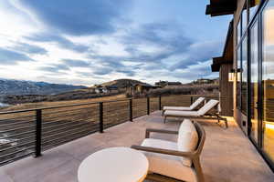 View of patio / terrace with a mountain view