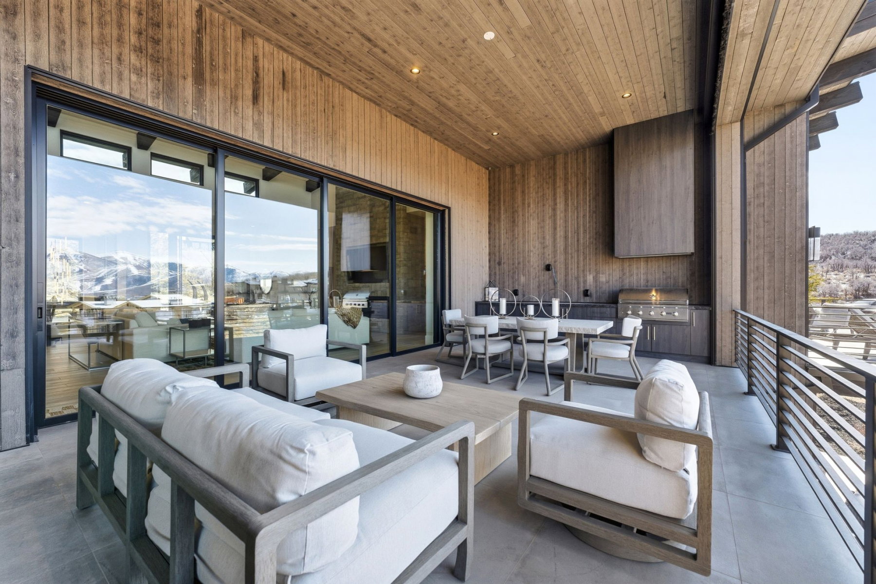 View of patio with exterior kitchen and an outdoor living / dining area