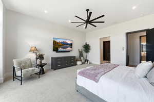 Bedroom featuring carpet flooring, ceiling fan, and recessed lighting