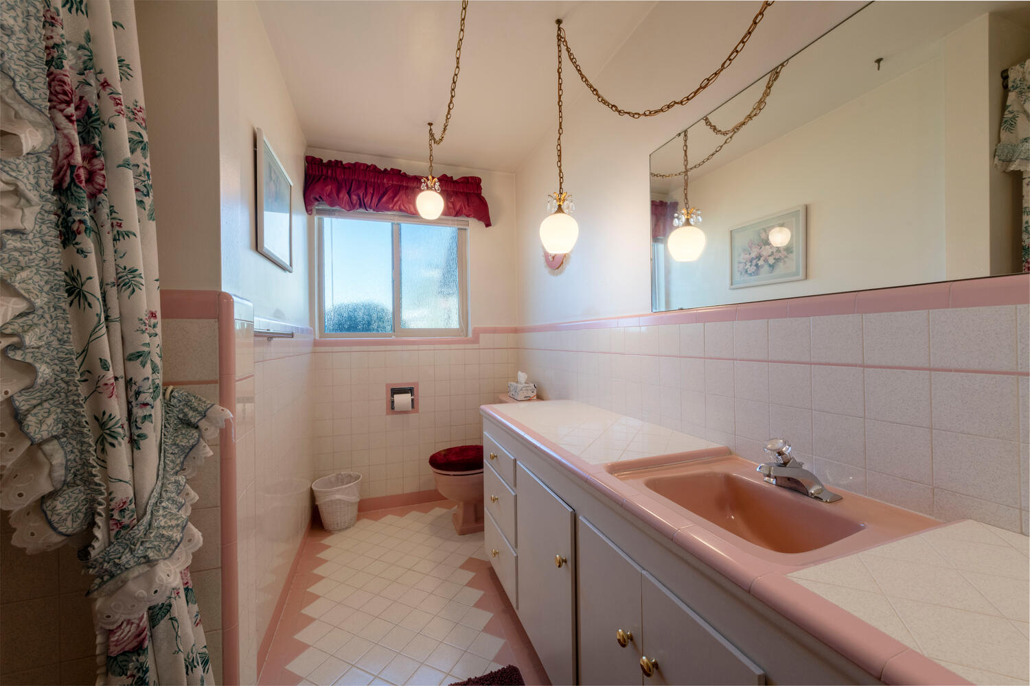 Bathroom featuring vanity, tile walls, a wainscoted wall, and a shower with shower curtain
