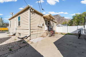 Rear view of property featuring a mountain view