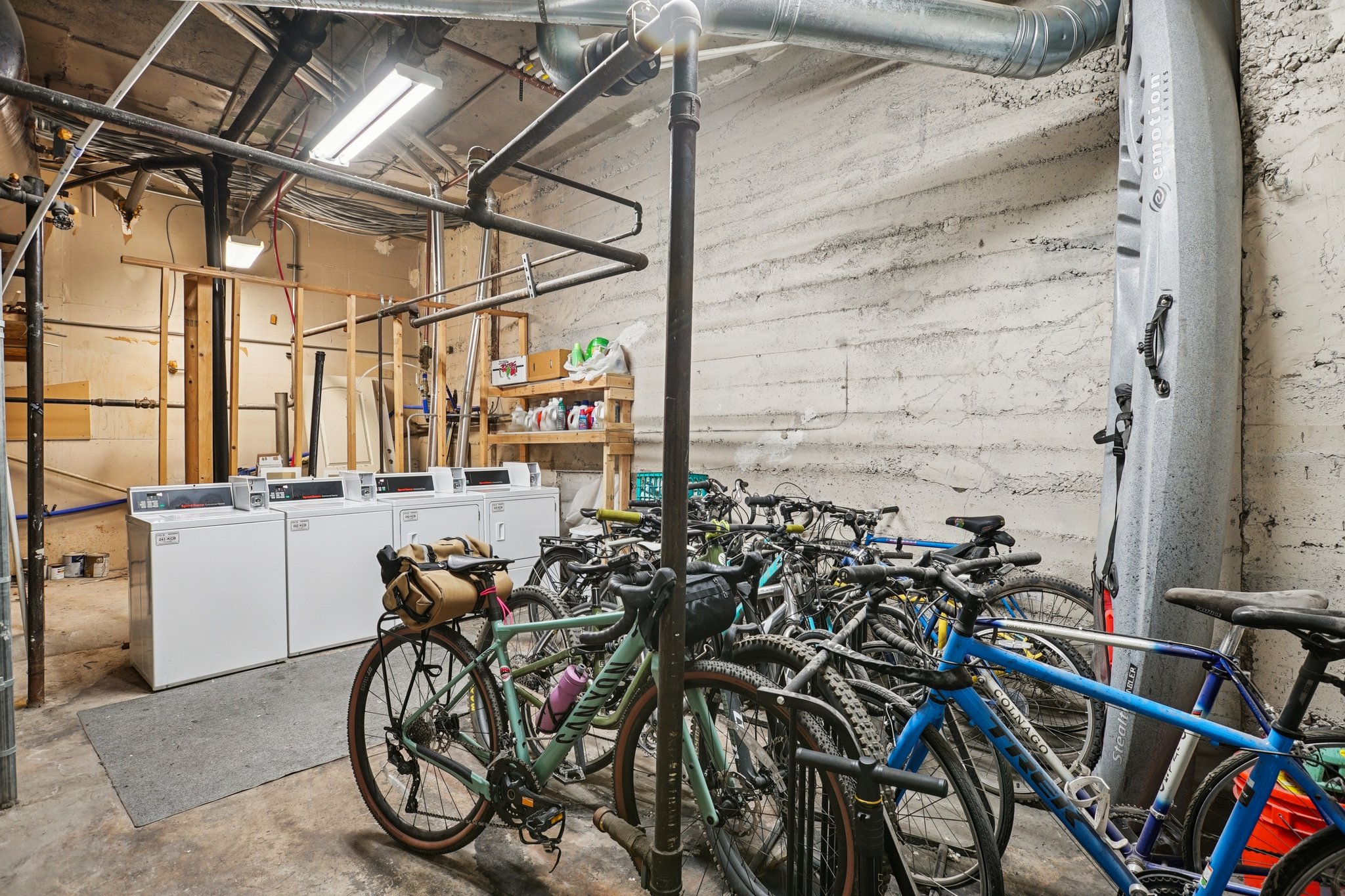 Garage featuring washing machine and clothes dryer