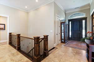 Aerial view of property and surrounding area featuring nearby suburban area