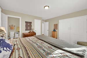 Spacious primary bedroom with 2 closets and en-suite bathroom