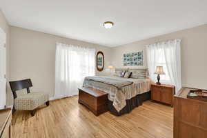 Spacious primary bedroom with 2 closets and en-suite bathroom