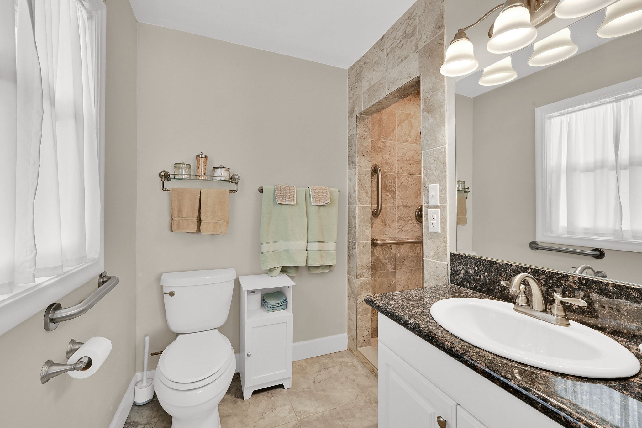 En-suite bathroom for primary bedroom with oversized shower