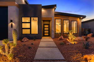 View of exterior entry at dusk