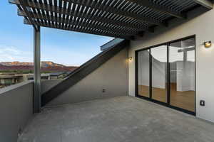 View of patio / terrace with a mountain view and a pergola