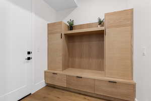 Mudroom featuring light wood-style floors