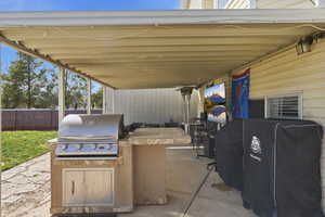 View of patio with area for grilling