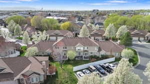 Aerial perspective of suburban area with a mountainous background
