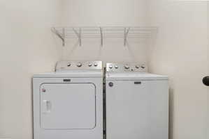 Laundry room with separate washer and dryer