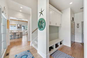 Mudroom with recessed lighting