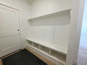 Mudroom with wood finished floors