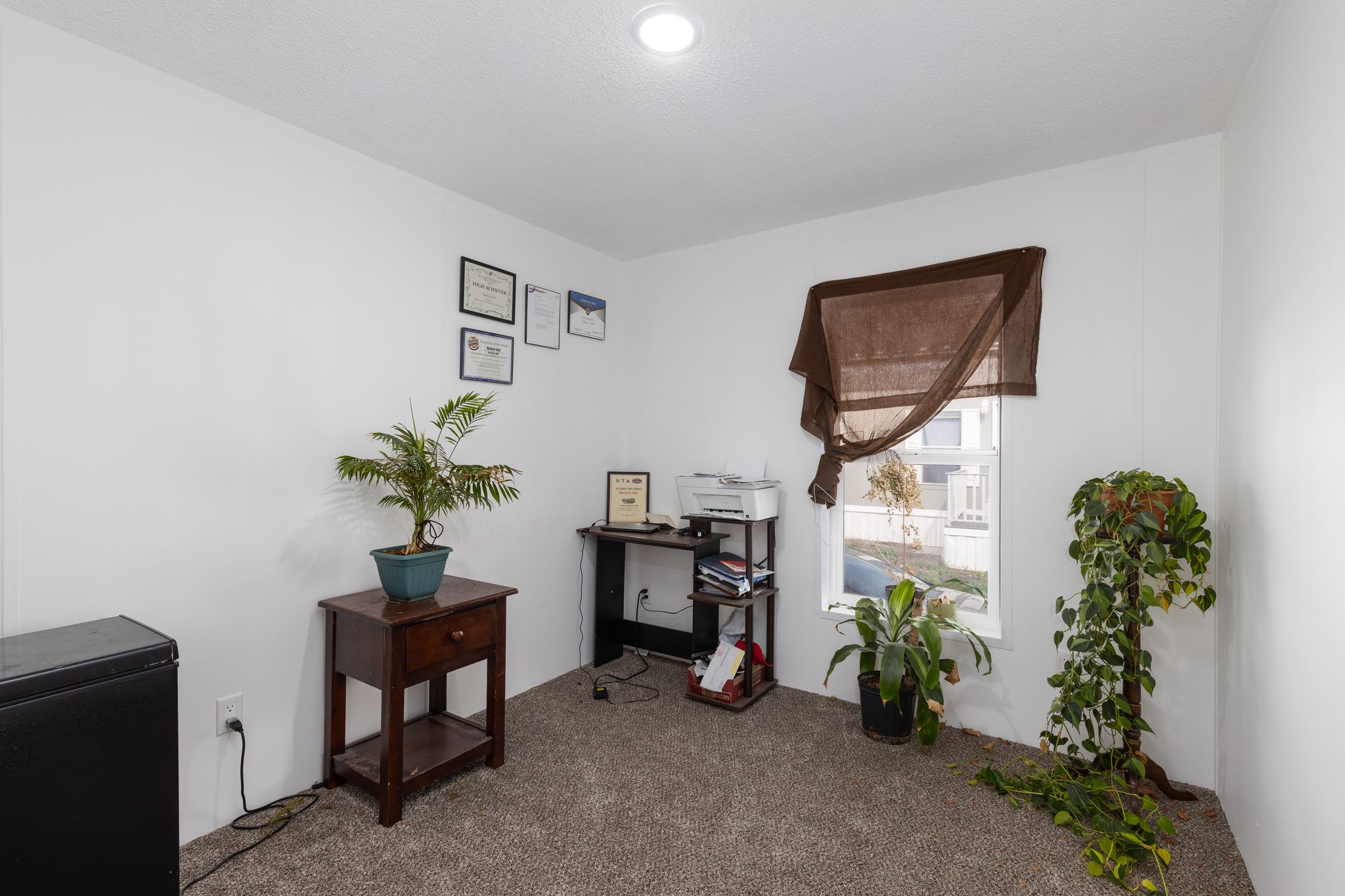 View of carpeted home office