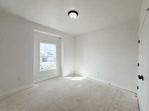 Spare room with baseboards