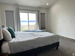 Carpeted bedroom featuring a mountain view and recessed lighting