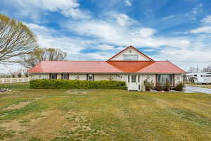 View of front facade with a metal roof