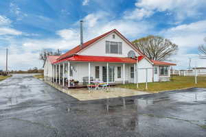 View of front of home with a metal roof