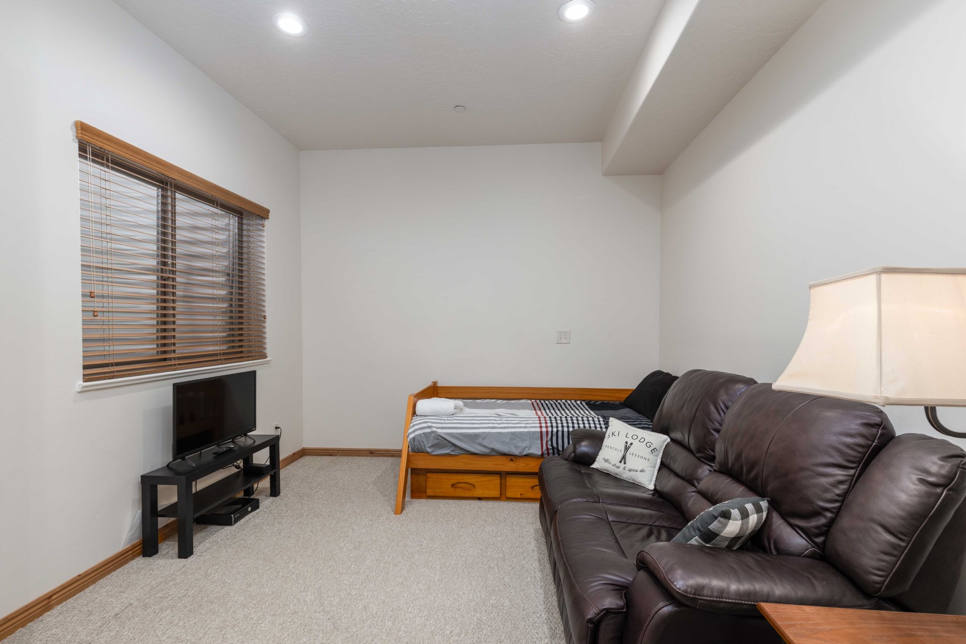 Bedroom featuring light colored carpet and recessed lighting