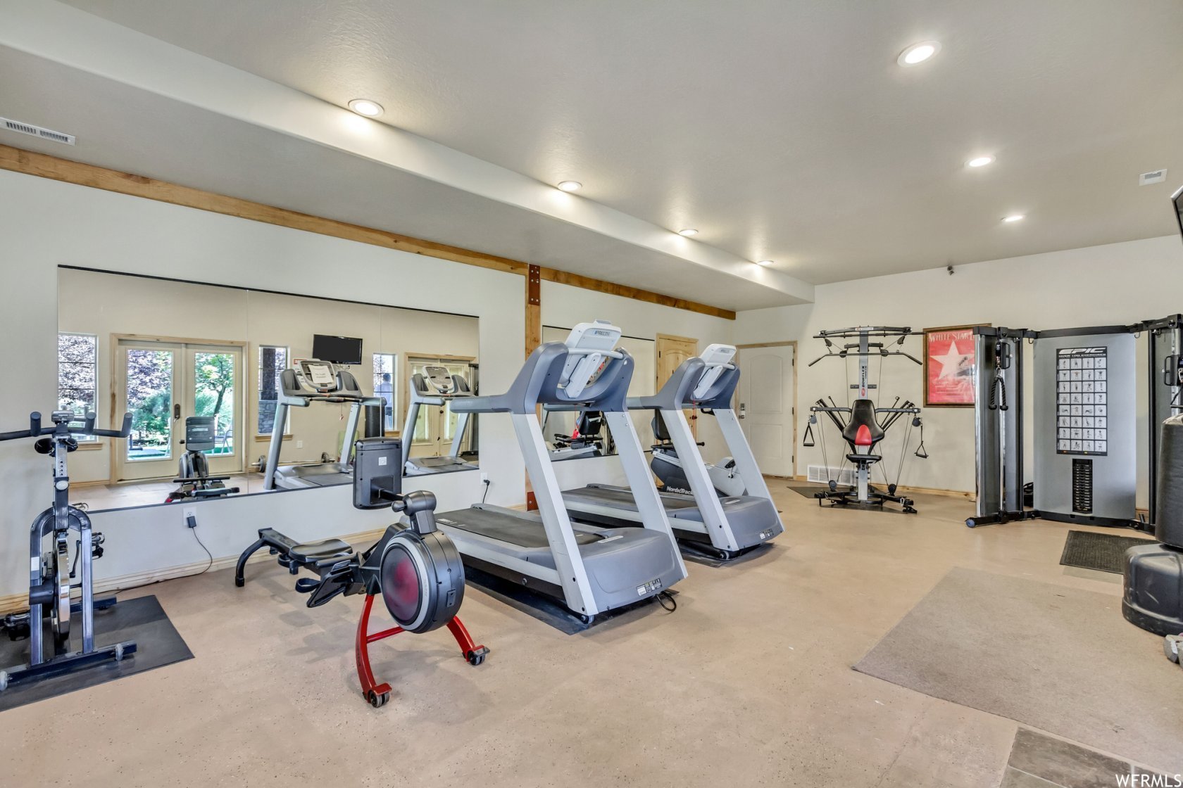Gym featuring recessed lighting