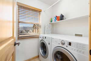 Laundry room featuring washing machine and dryer