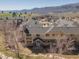 Aerial view of residential area with a mountain backdrop