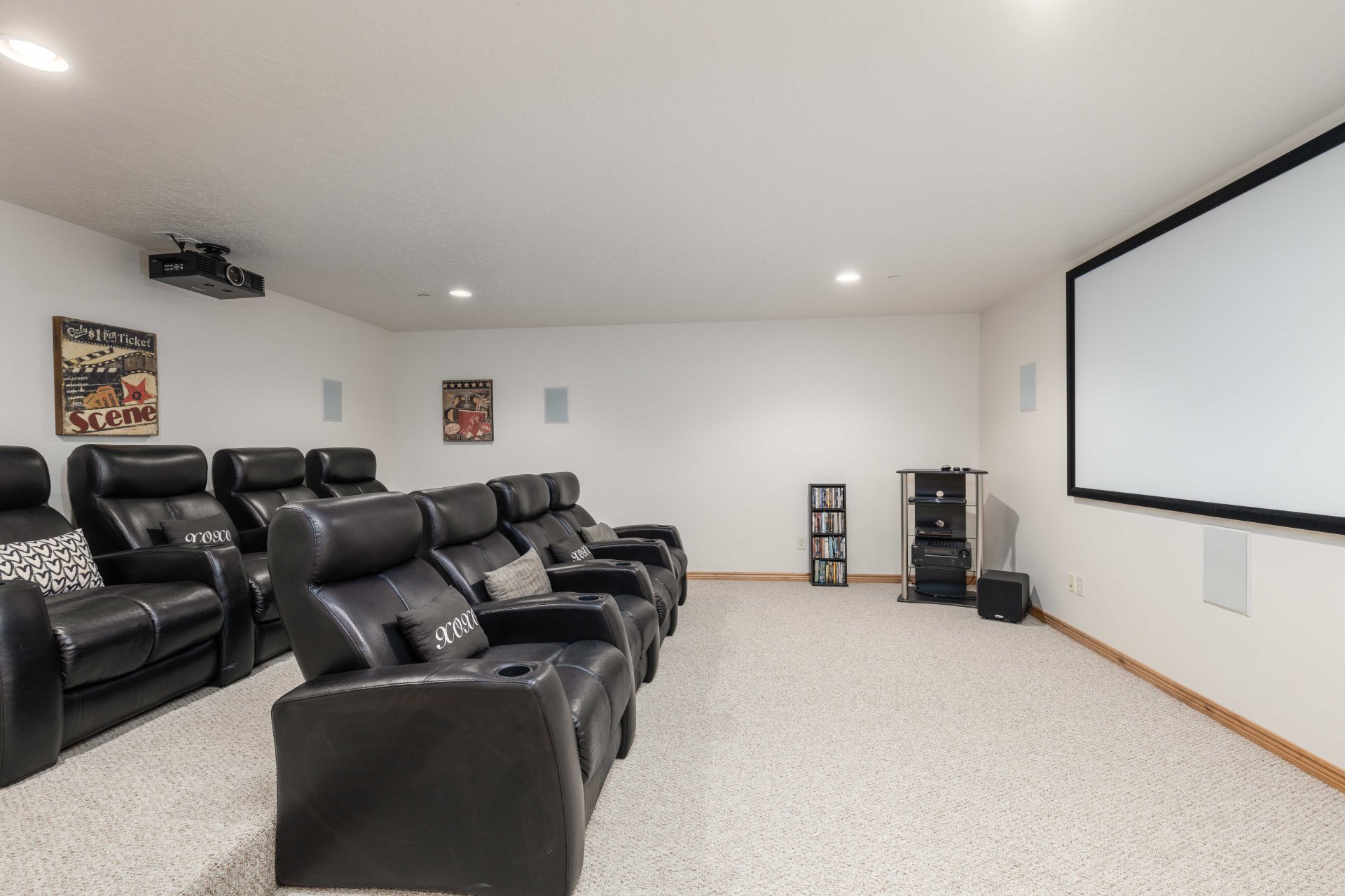 Home theater featuring light colored carpet and recessed lighting