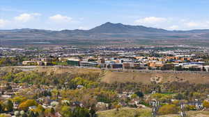 Mountain view featuring nearby suburban area