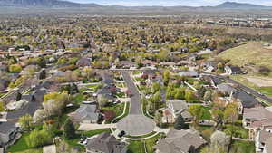 Aerial view of property's location featuring nearby suburban area