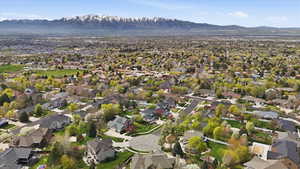 Aerial perspective of suburban area with mountains