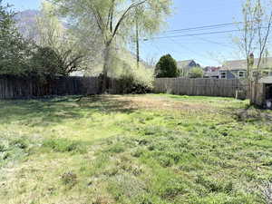 View of fenced backyard