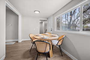 Dining room featuring light wood-style floors