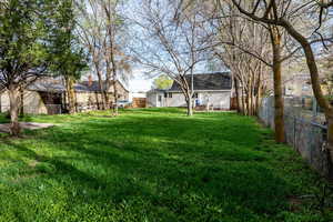 View of fenced backyard