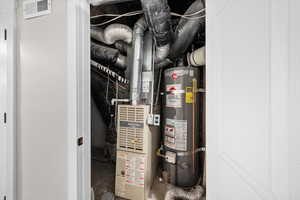 Utilities with strapped water heater and heating unit