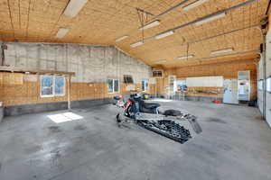 Garage featuring a heating unit