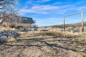 View of yard featuring a mountain view